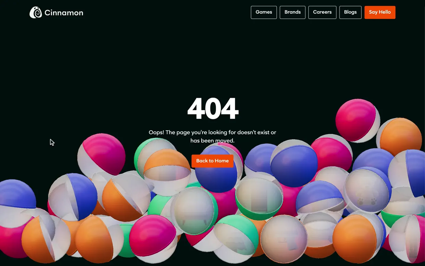 On the 404 page, a cursor sweeps in wide arcs through a pit of about sixty two-tone capsules, flinging them around the 404 title before they tumble back and settle.